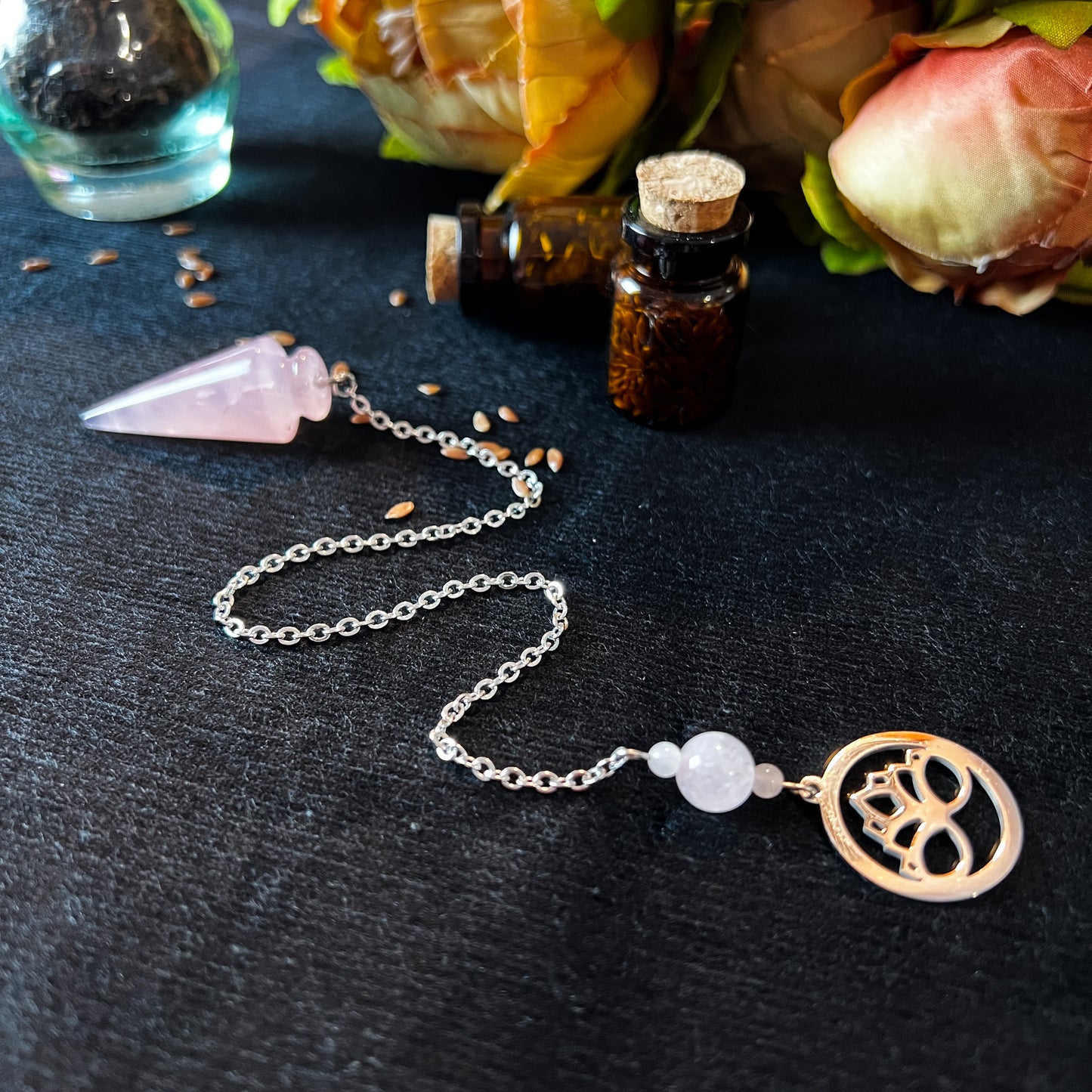Rose quartz and stainless steel lotus flower pendulum The French Witch shop