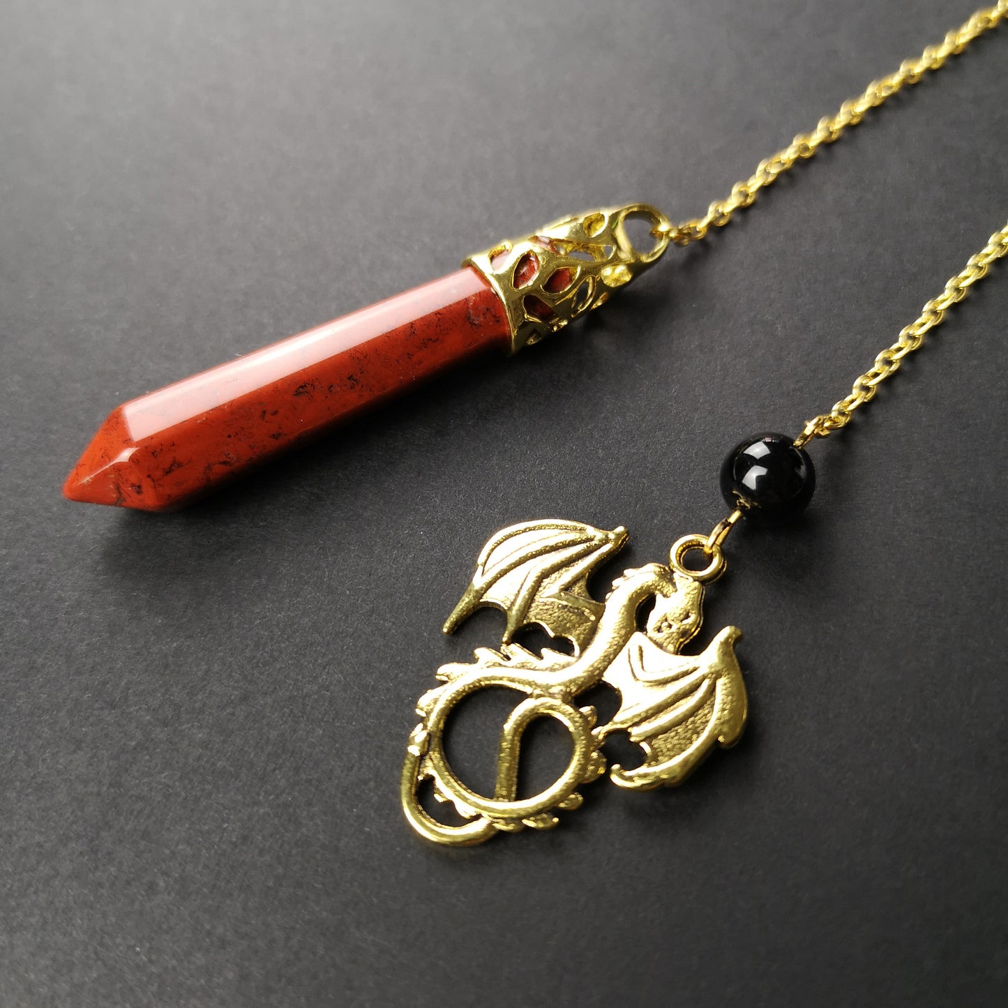 Golden Red jasper and obsidian dragon pendulum The French Witch shop