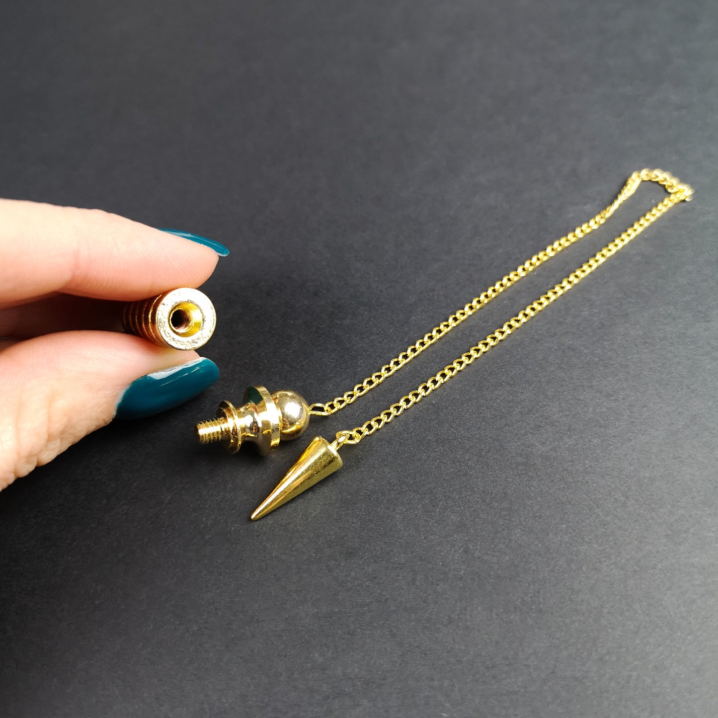Golden Egyptian Isis dowsing pendulum with a chamber Baguette Magick