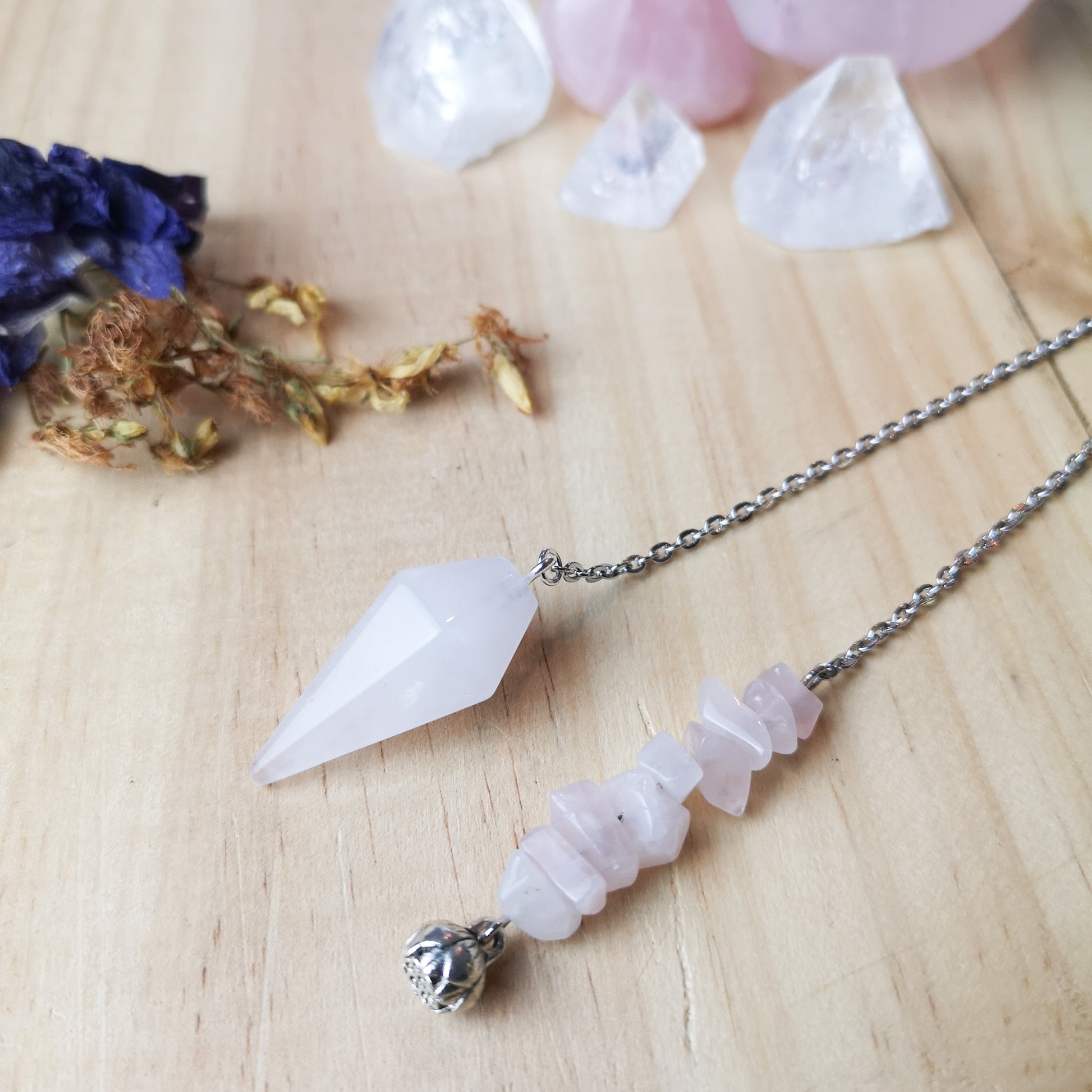 Rose quartz dowsing pendulum, with a lotus seed charm, gemstone spiritual divination tool