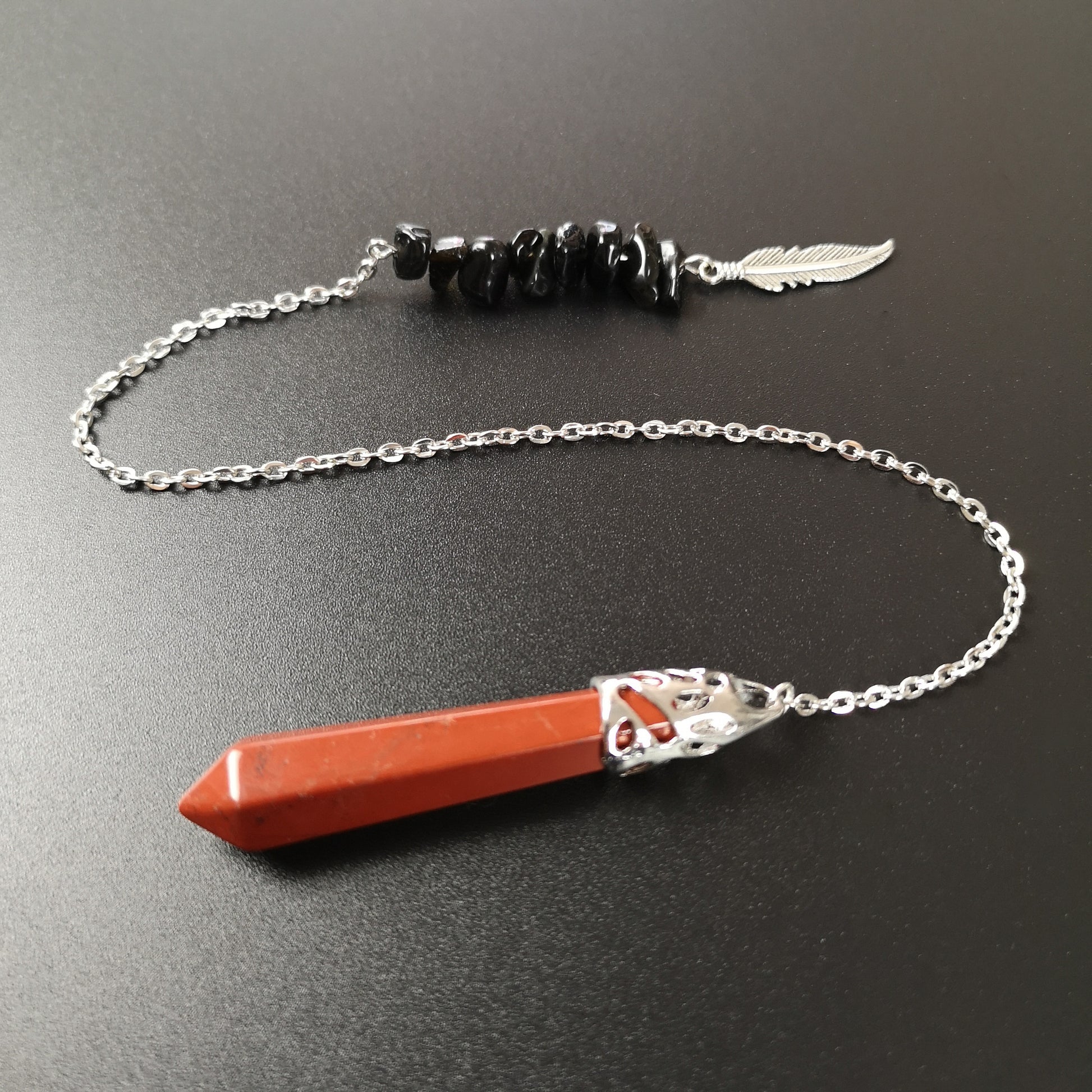Red jasper and obsidian feather pendulum The French Witch shop