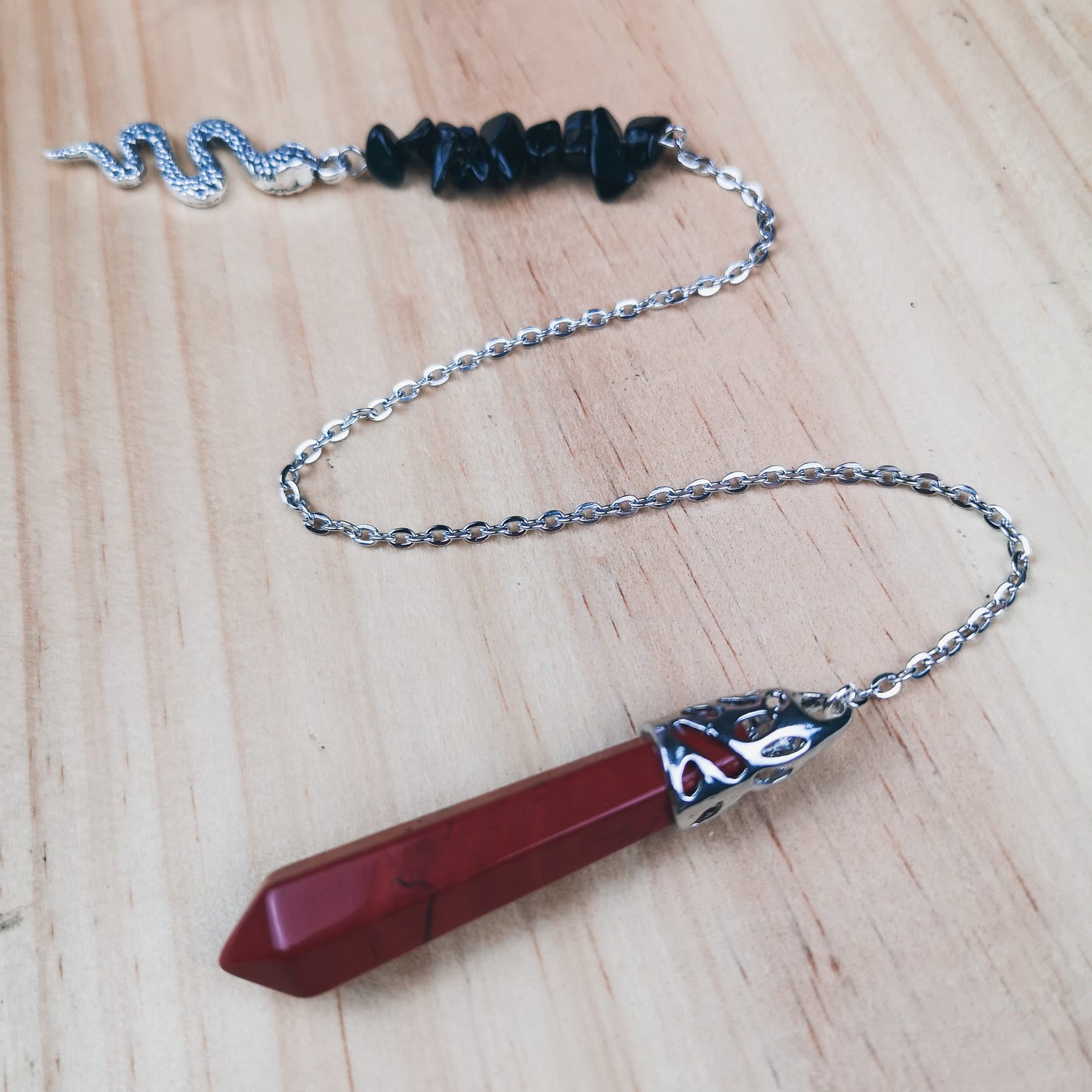 Red jasper and obsidian snake pendulum Baguette Magick