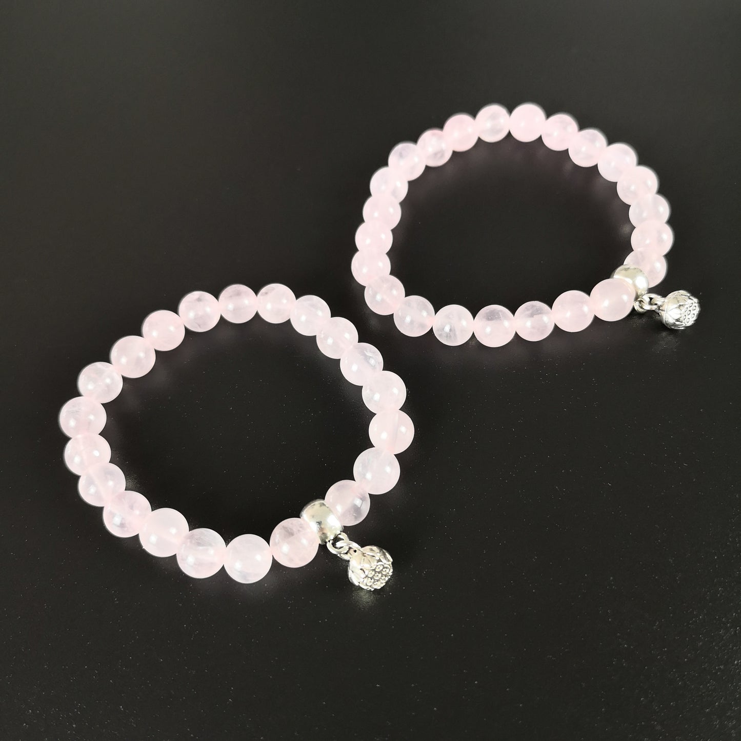 Rose quartz mala beaded bracelet with a lotus seed charm The French Witch shop