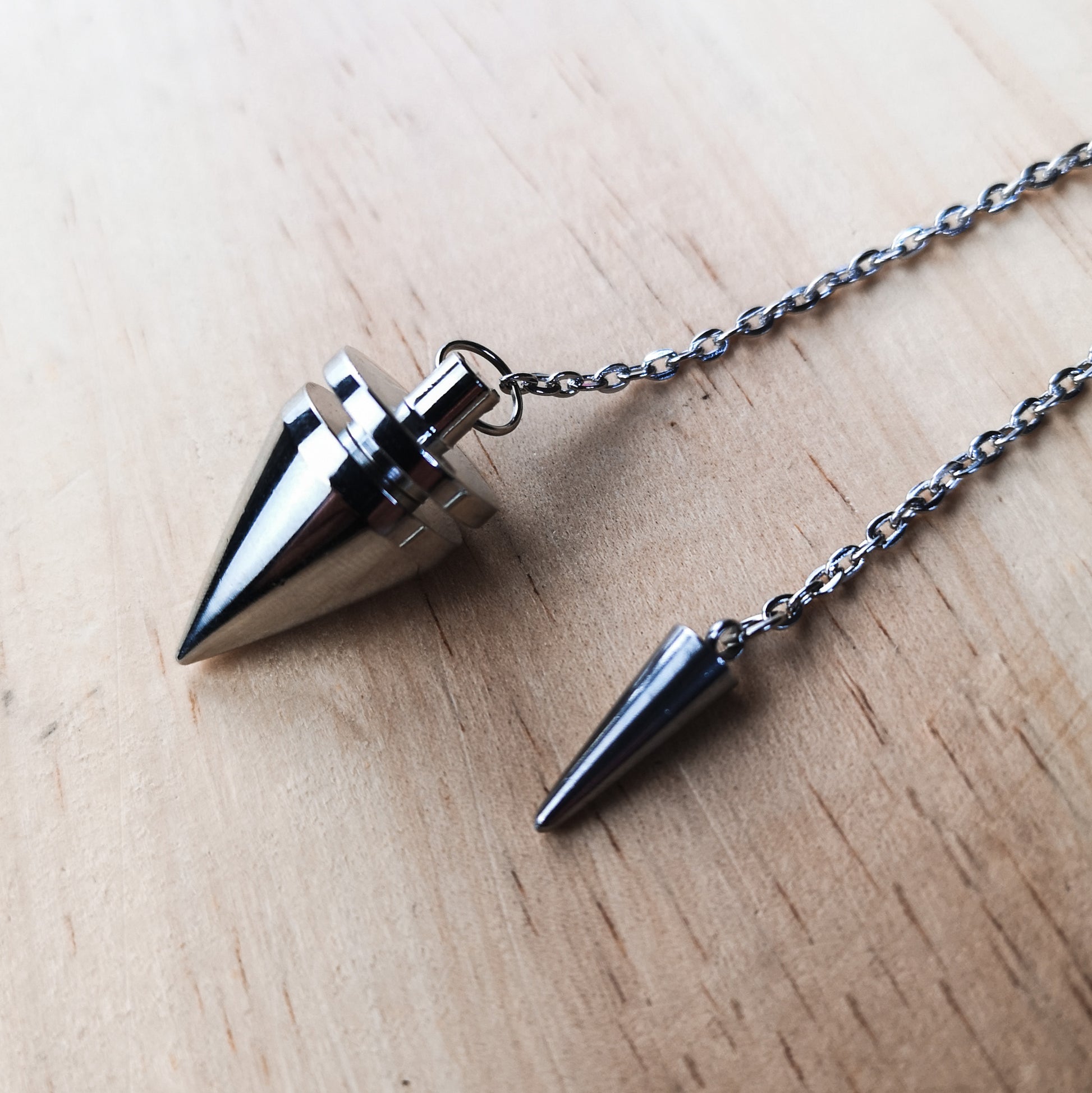 Cone and coil classic dowsing metal pendulum with a spike charm - The French Witch shop