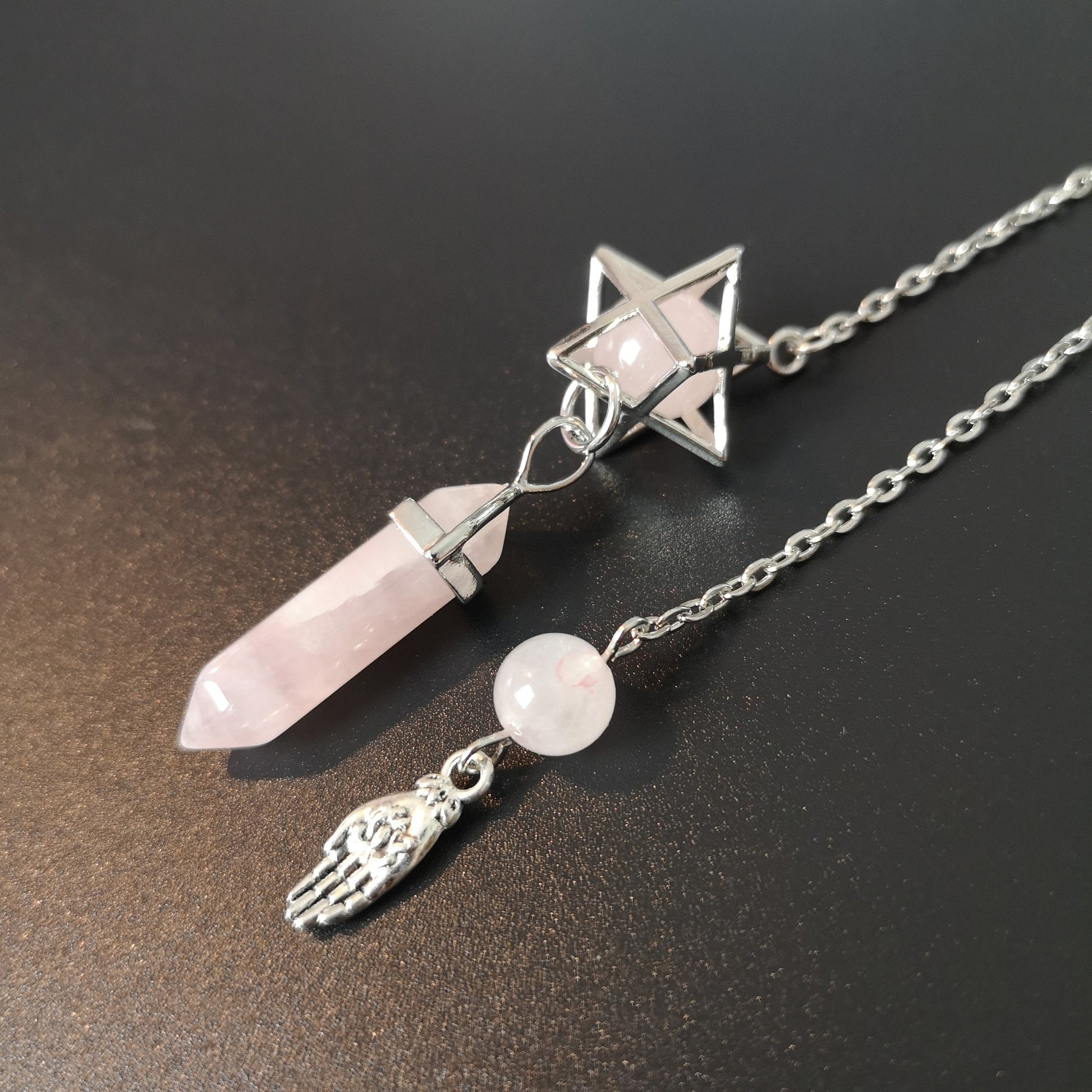 Rose quartz Merkaba and hand lotus symbol pendulum The French Witch shop