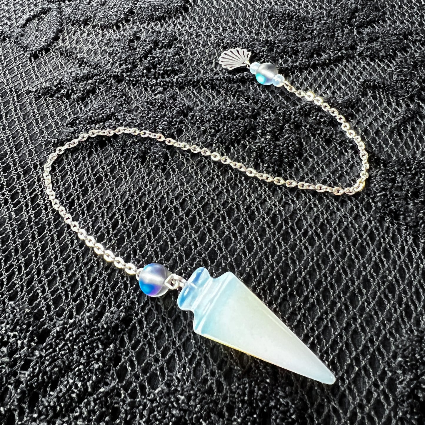 Sea witch pendulum made with opalite, stainless steel and mermaid glass The French Witch shop