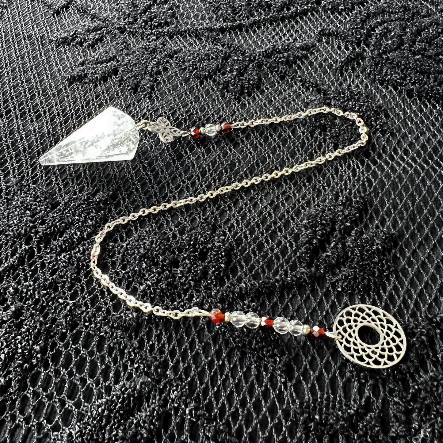 Quartz, garnet and stainless steel sacred geometry pendulum Baguette Magick