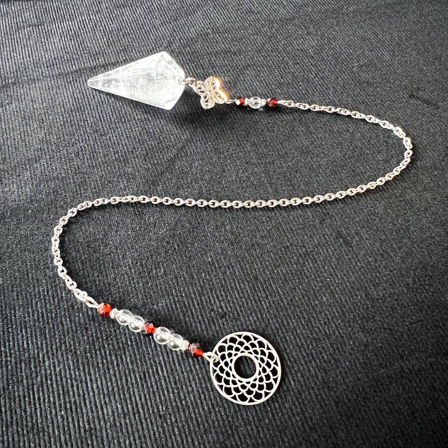 Quartz, garnet and stainless steel sacred geometry pendulum Baguette Magick