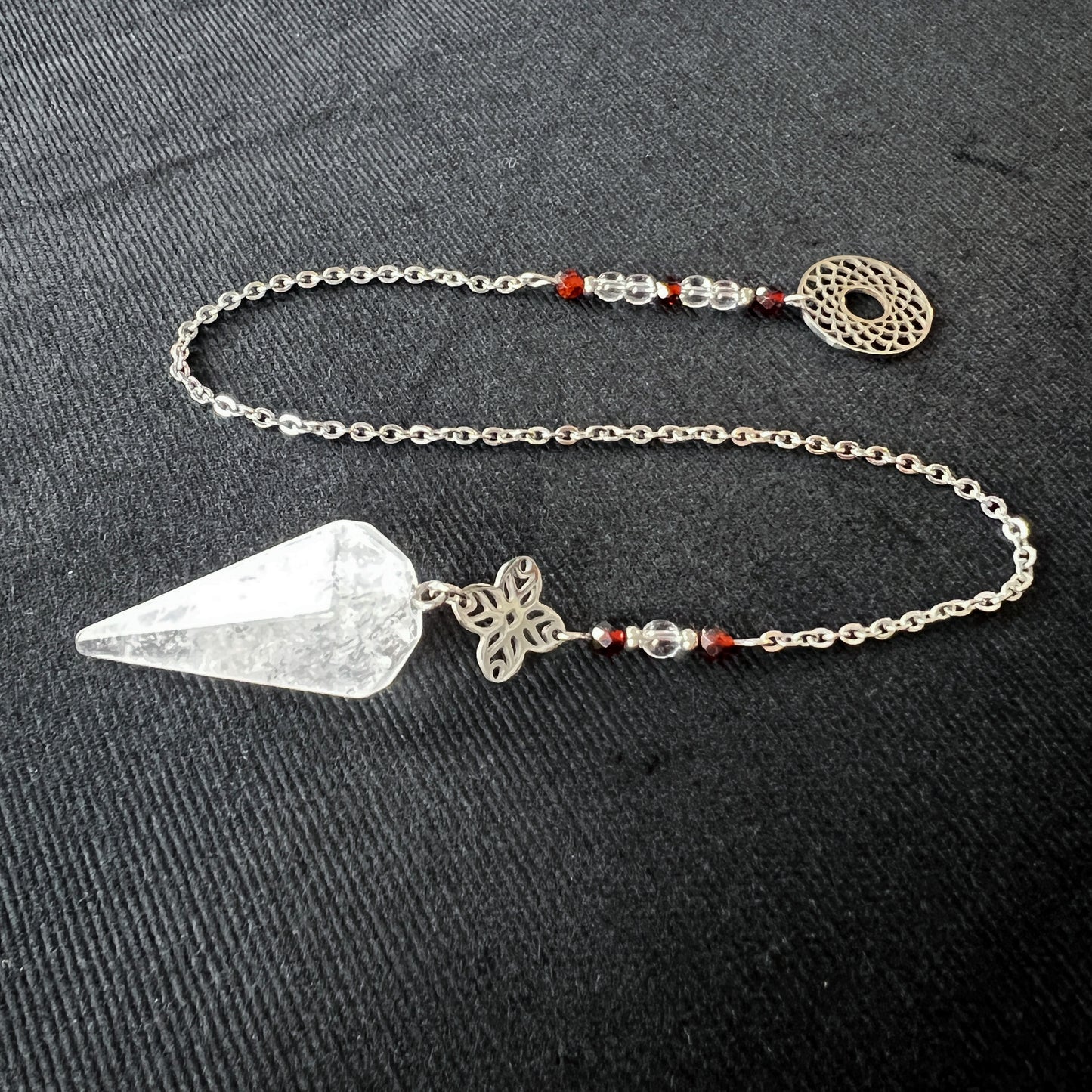 Quartz, garnet and stainless steel sacred geometry pendulum Baguette Magick