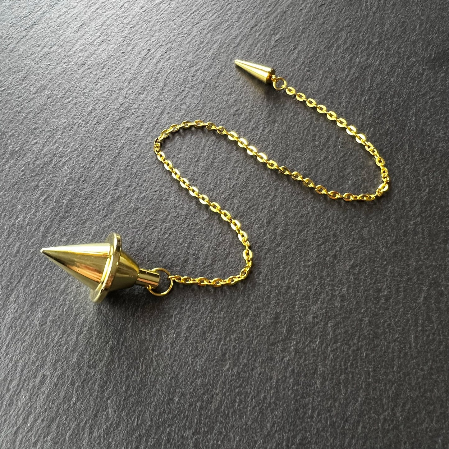 Golden double cone pendulum with a spike charm - The French Witch shop