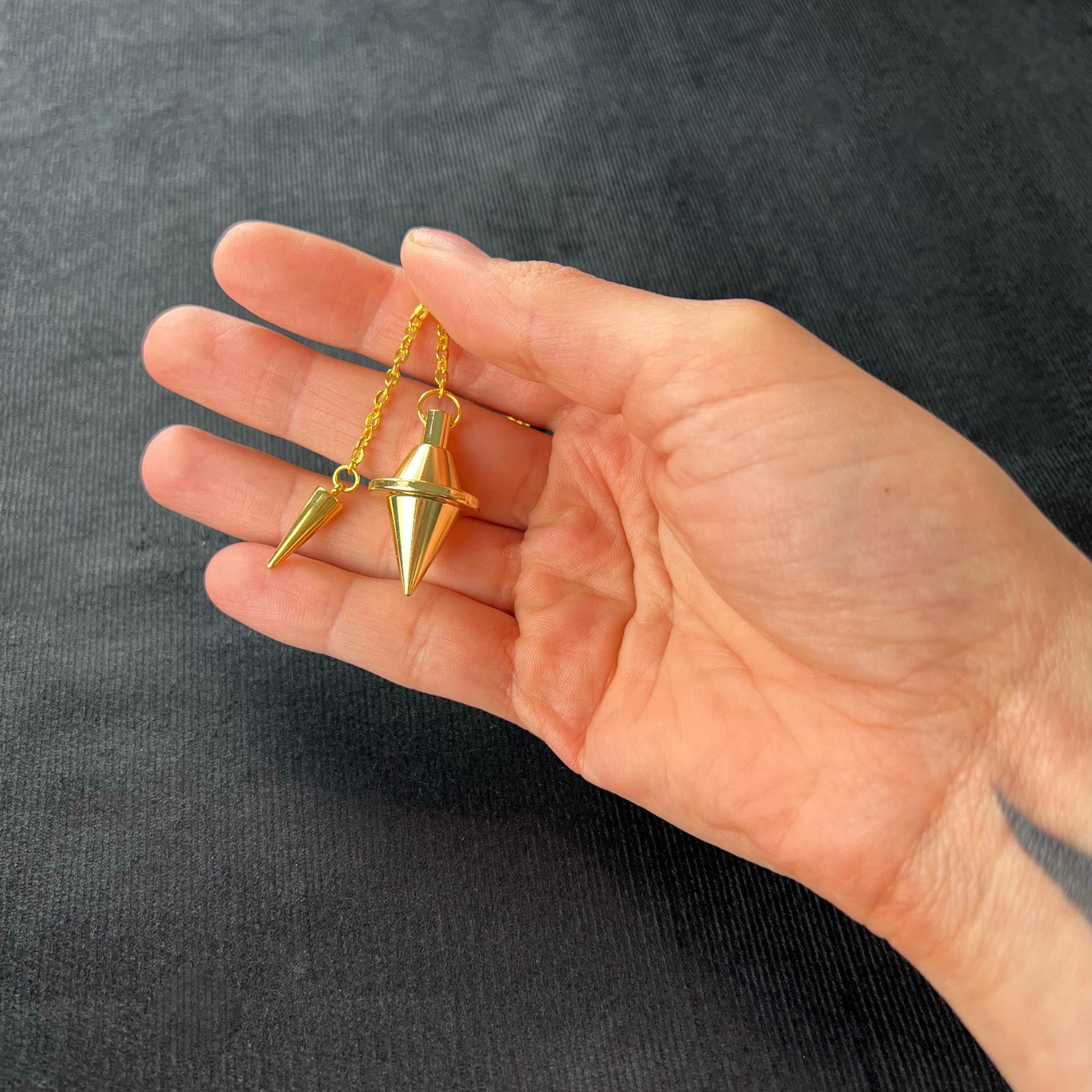 Golden double cone pendulum with a spike charm - The French Witch shop