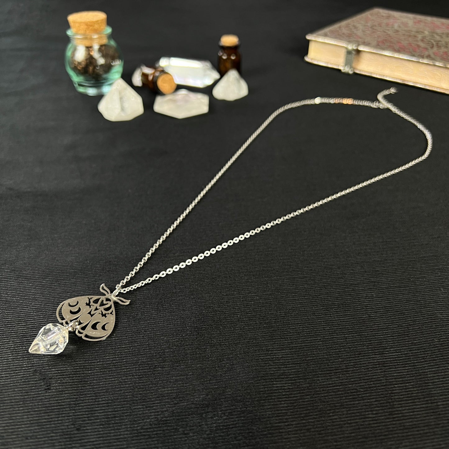 Moth potion necklace made of stainless steel with moon phases Baguette Magick