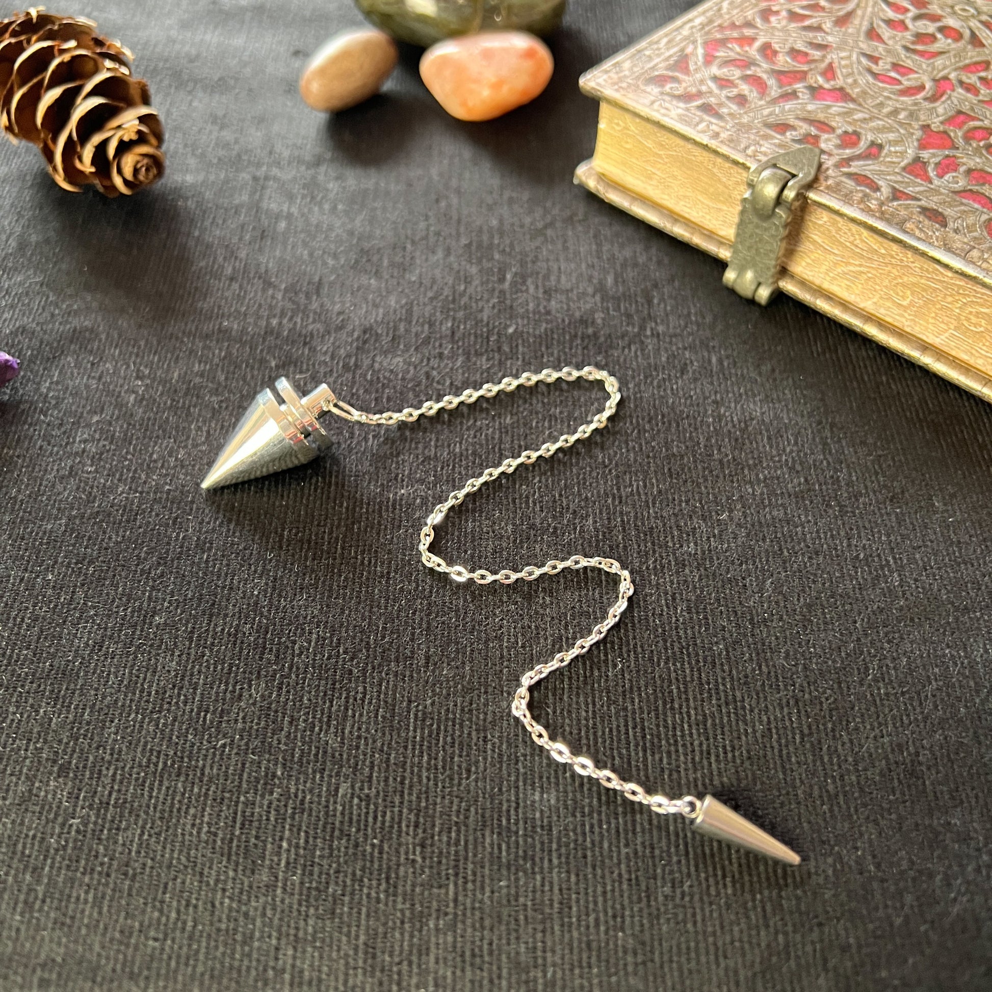 Cone and coil classic dowsing metal pendulum with a spike charm Baguette Magick