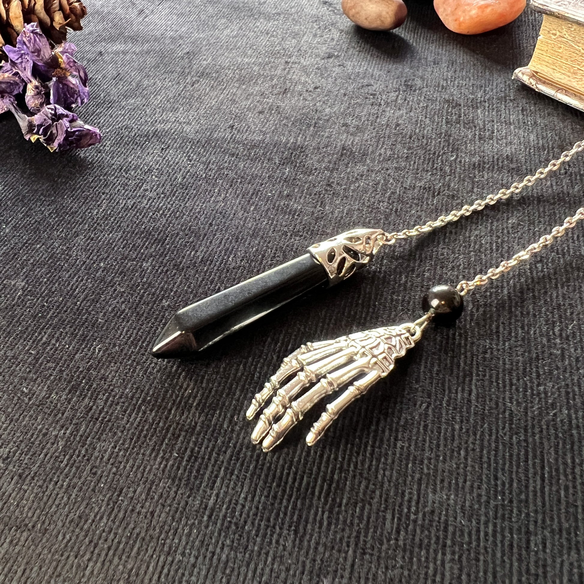 Divination tool Onyx and obsidian skeleton hand goth pendulum dowsing spiritual fortune telling witchcraft gothic pendulum